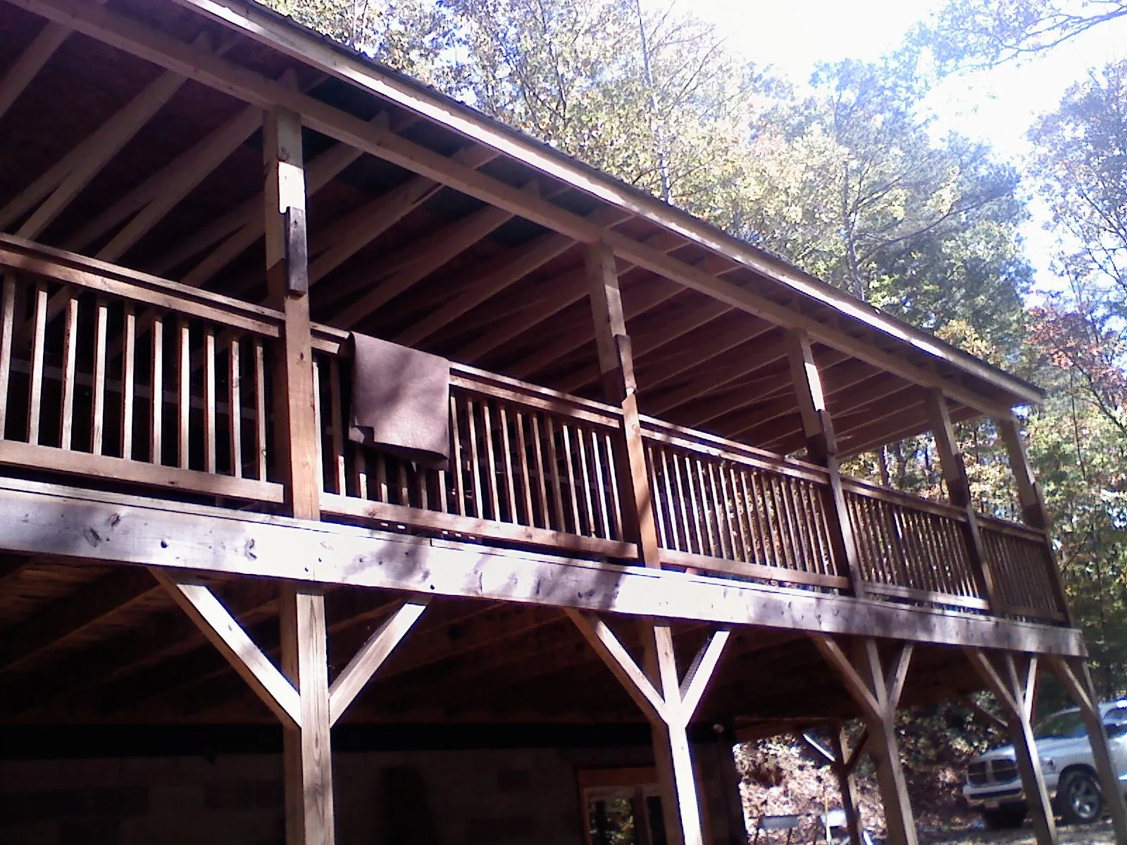 Timber framing under a new elevated porch and deck — Roof Leak Repair in Stoneboro by Roofing Brothers